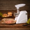 Masina de tocat carne electrica Adler, Putere maxima 2000W, Functie Puls si Reverse, Include 3 discuri de taiere si palnie pentru carnati, Alb